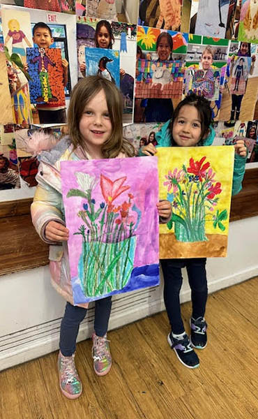 kids-art-projects children with their flower arrangement art projects