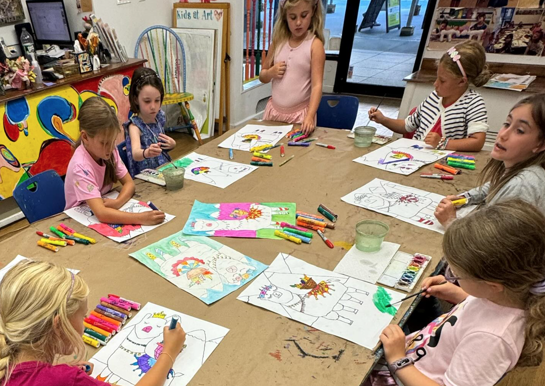 children making creative llama paintings at Kids at Art