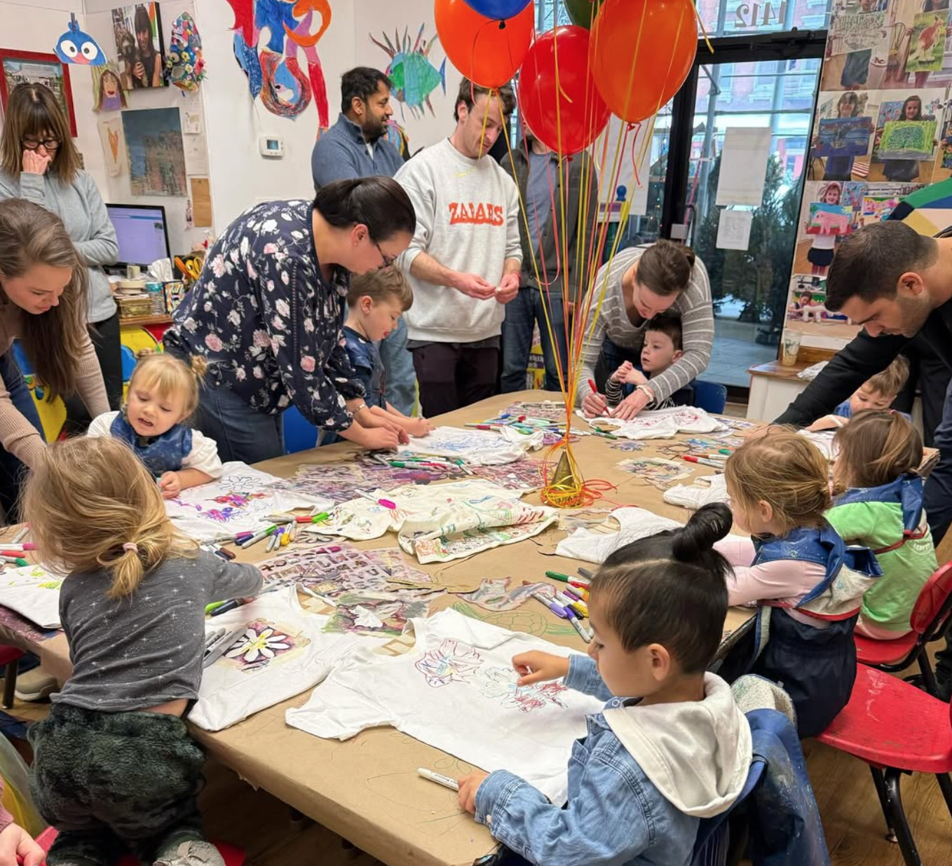 decorating t-shirts at a kids at art birthday party