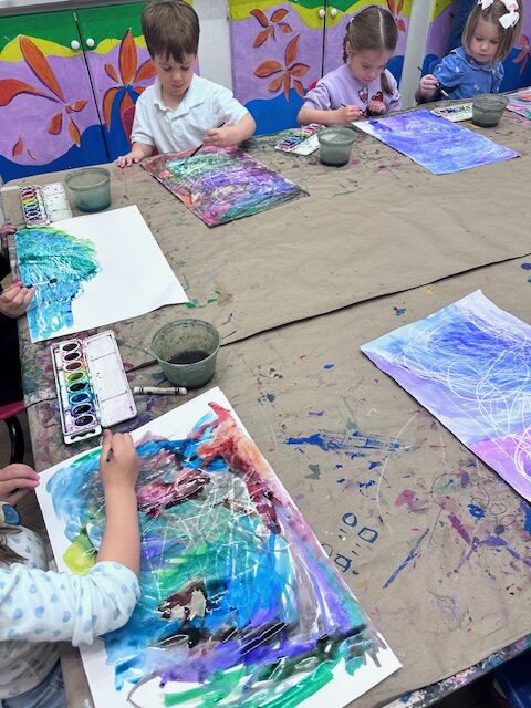 kids around the art table